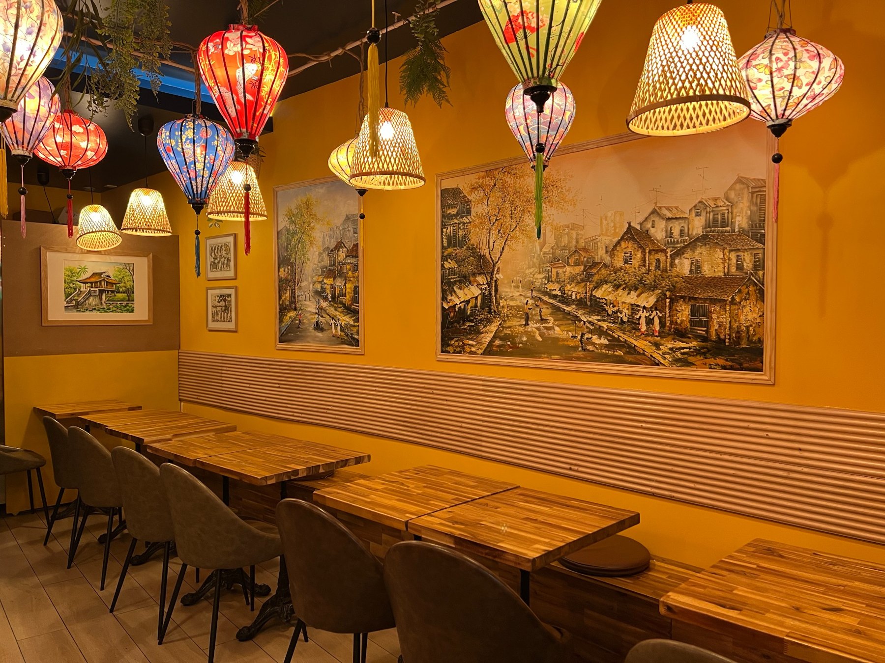 Vietnamese-inspired decor wall inside Phở Hà Nội Quán